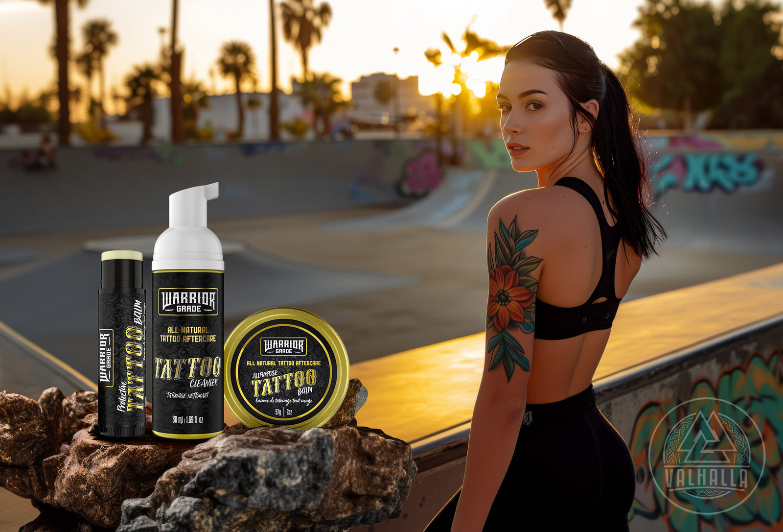 Women at a skate park with black hair and a flower tattoo on her arm, with the sunset in the background, Valhalla Live the Legends Tattoo Aftercare Products sitting on a rock in the foreground.
