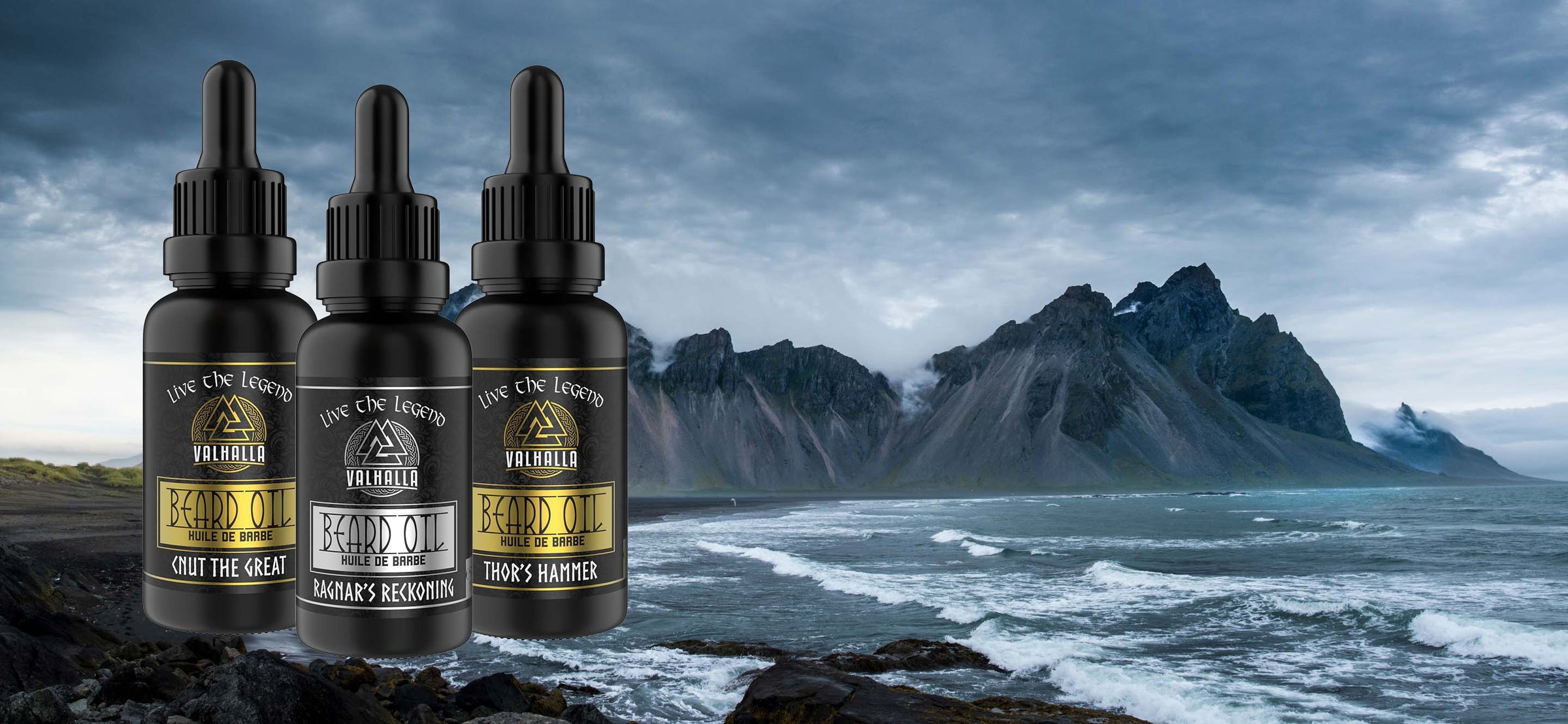 Beard Oil Collection by Valhalla Legend - Three Beard Oils placed on a Norse background with mountains and a sea shore.