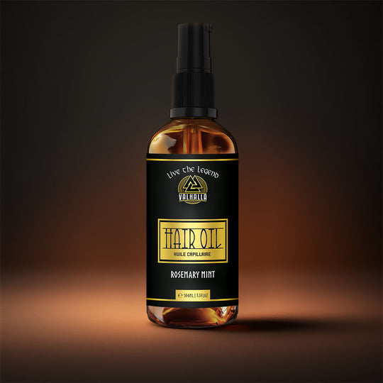 Bottle of 100% Natural Hair Oil on a luxurious rich background. Made by Valhalla Live the Legend. Canadian Made Hair oil